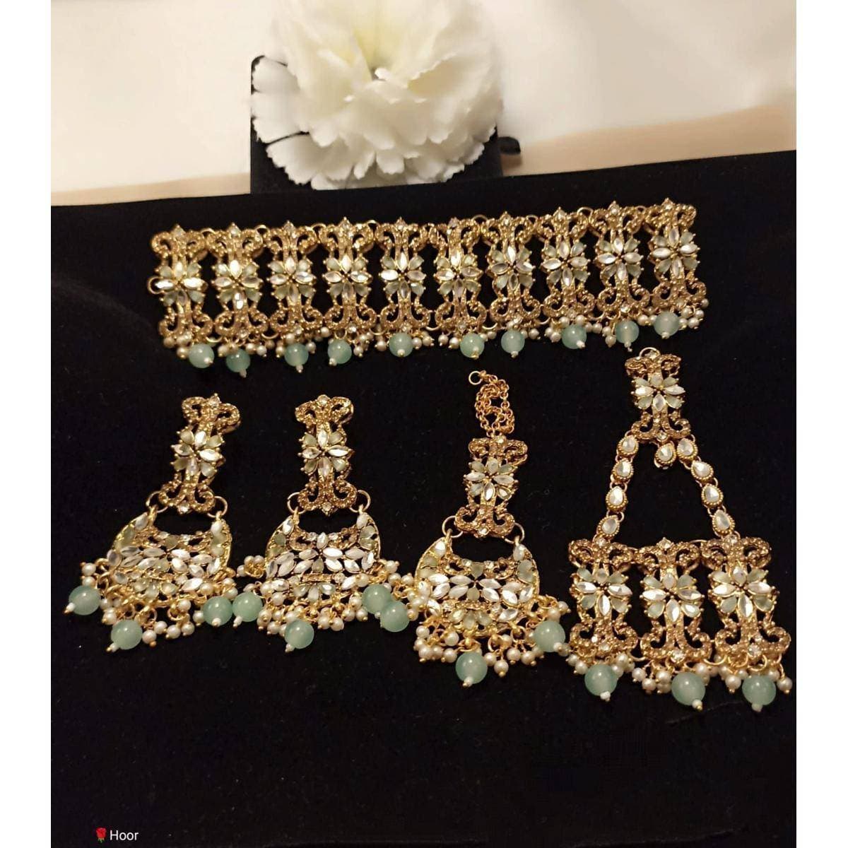4 in 1 Beautiful Design Golden Jhomer, Tikka & Earing set for Women